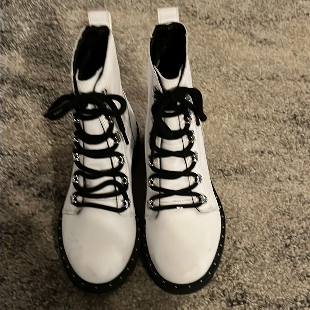 White Sorel Combat Boots with Chunky Silhouette and Black Laces